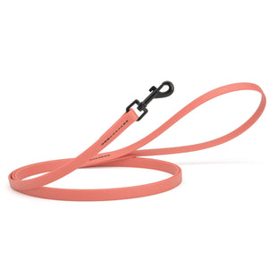 Coral dog leash with black swivel clip, made from waterproof Biothane, 6 feet long, 1/2 inches wide