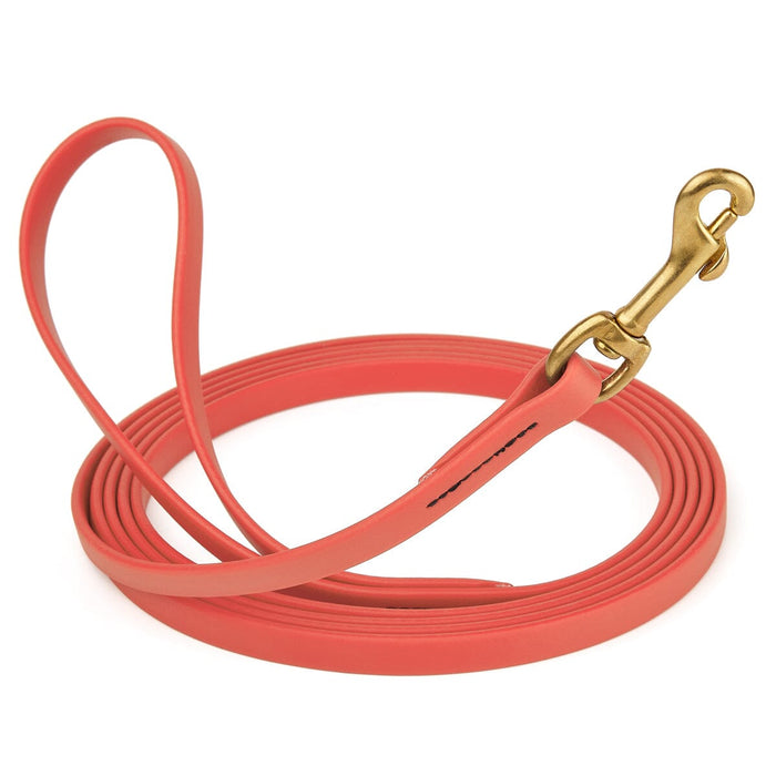 Coral Biothane dog leash with brass swivel snap hook, 1/2 inch wide, 33 feet long