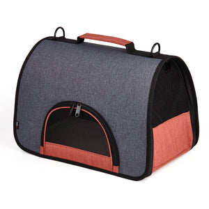 Black and orange pet carrier for small dogs and cats with mesh screens, collapsible design
